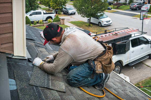 Professional Gutter Installation technician working in Churchville, NY